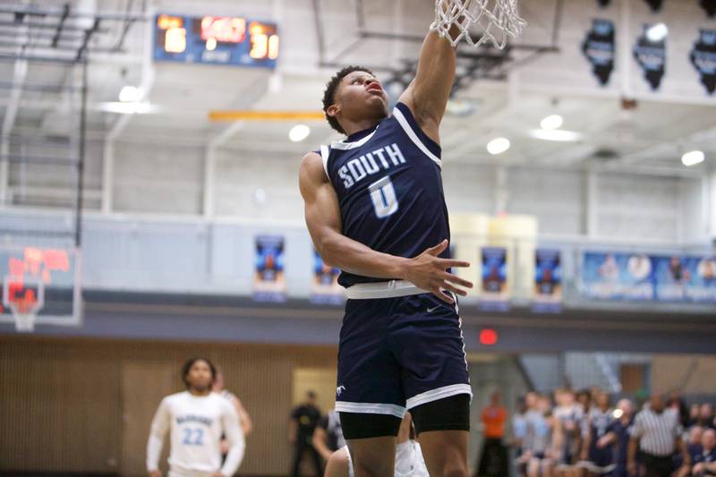 Downer's Grove South's Dominic Marcantelli puts the shot up on the break away against Willowbrook on Friday, Feb.2,2024 in Villa Park.