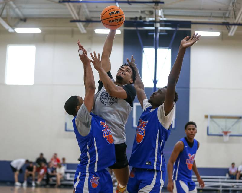 Oswego East's Myles Buchanan shoots a jump shot at the Riverside-Brookfield Summer Shootout basketball tournament. June 22, 2024.