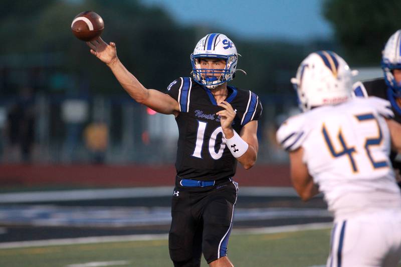 St. Charles North quarterback Ethan Plumb throws the ball during a game against Wheaton North Friday, Sept. 13, 2024 at St. Charles North.