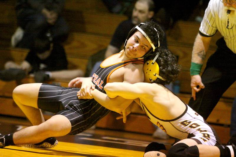 Jacobs’ Dom Ducato, right, battles Crystal Lake Central’s Ramiro Rendon at  120 pounds in varsity wrestling Thursday at Algonquin.