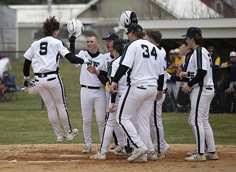 Rock Falls’ Colby Ward stomps on home plate after a solo home run against Sterling Friday, March 29, 2024 at Rock Falls High School.