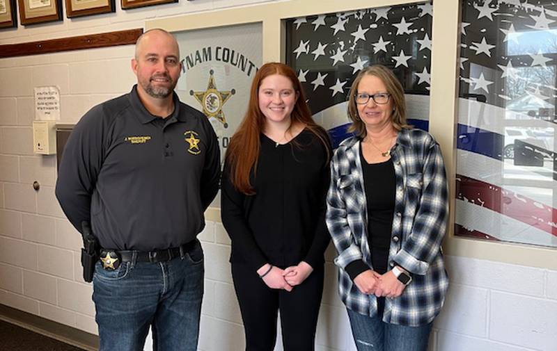 (From left) Putnam County Sheriff Josh Boedigheimer, intern Emma Henderson and Putnam County dispatch supervisor/911coordinator Lynn Haage pose for a photo.