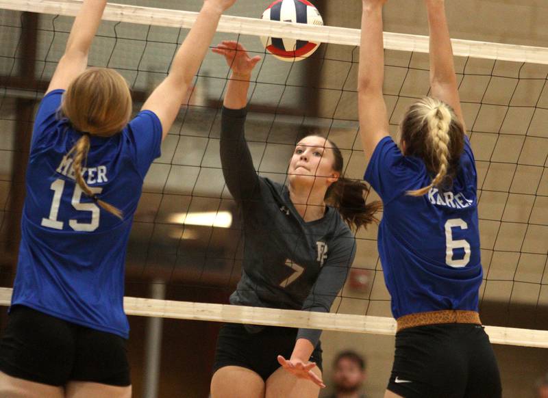 Prairie Ridge’s Addison Gertz hits the ball against Woodstock in IHSA Class 3A sectional semifinal volleyball action at Woodstock North Monday.