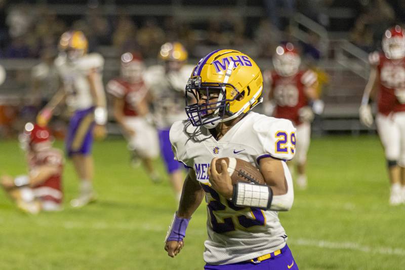 Mendota's Jayden Lesley breaks through the defense and runs the ball into the endzone for a touchdown against Hall Highschool at Richard Nesti Stadium on September 13, 2024.