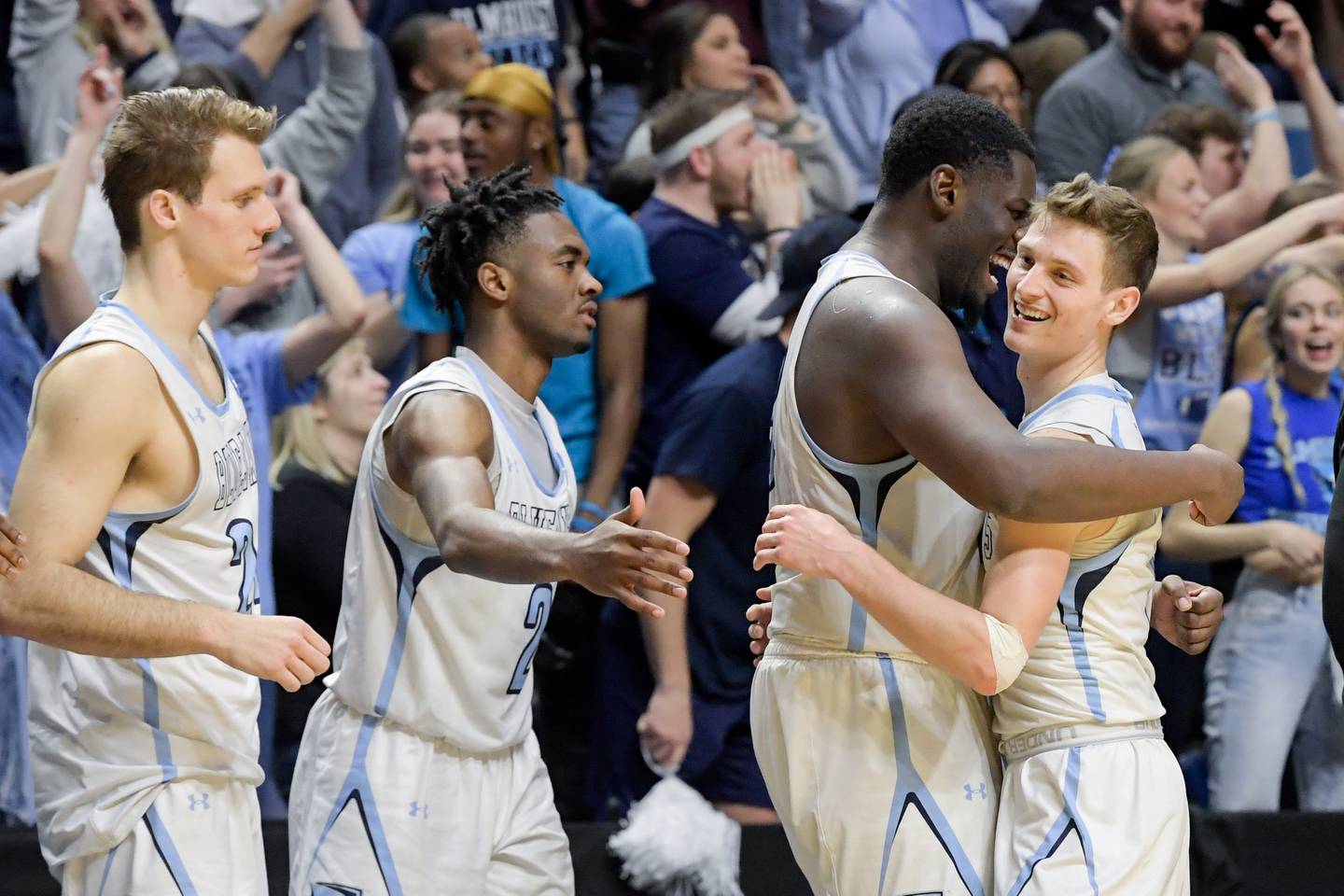 Elmhurst University players celebrate during their Final Four win over Wabash.