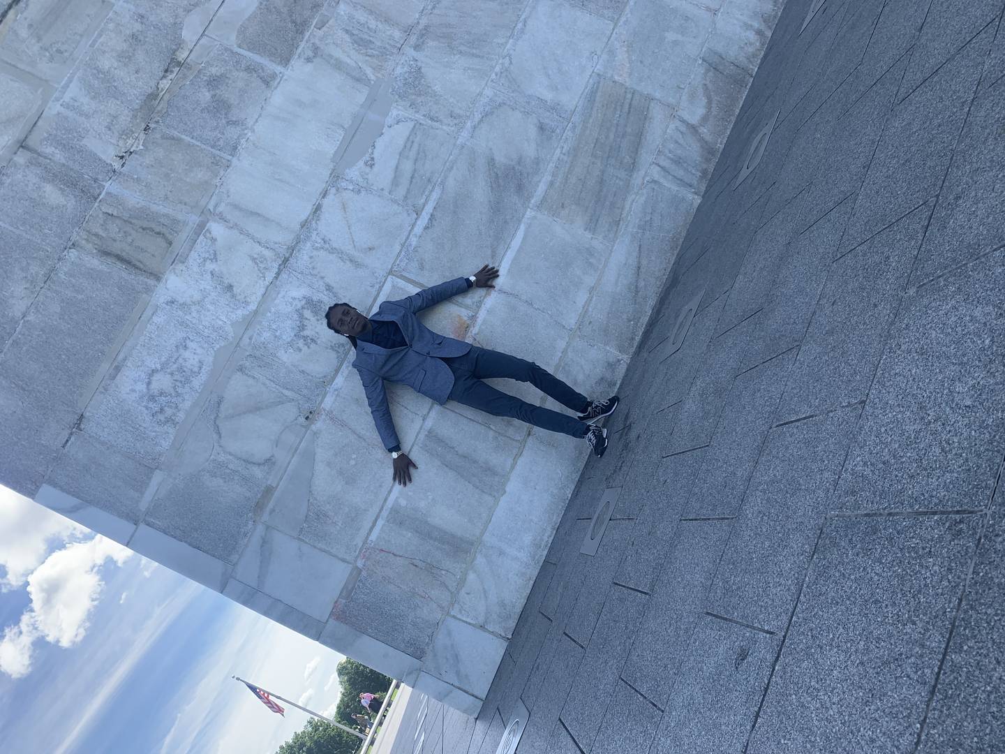 Justin Johnson is seen standing outside the Dr. Martin Luther King Jr. Memorial  during a trip to D.C. held Mother's Day weekend.