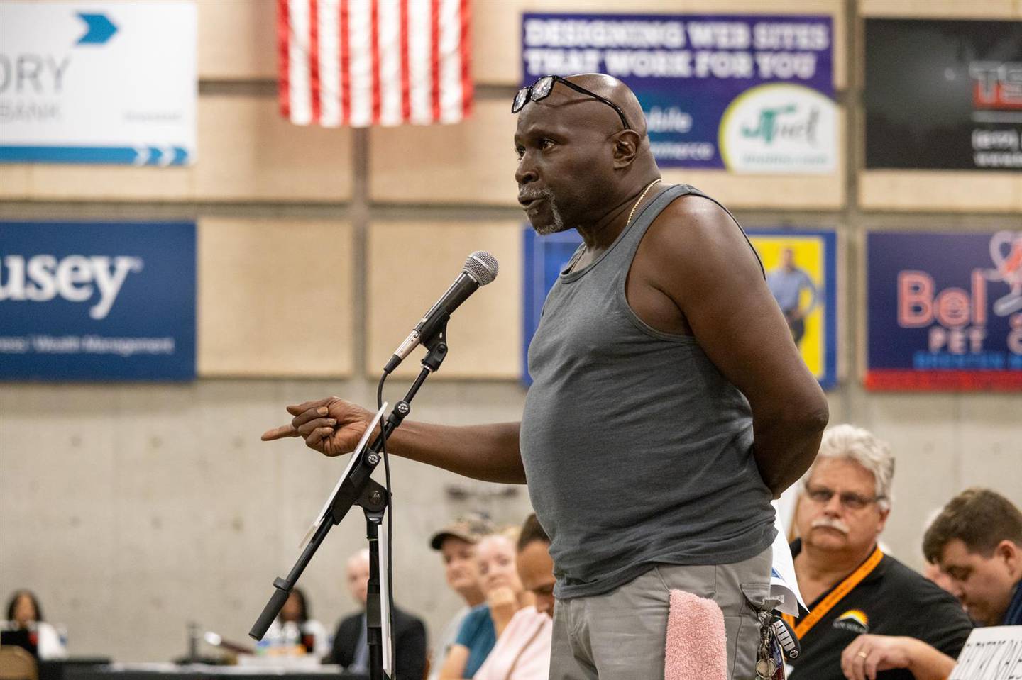 Richard Peterson, a member of the public, speaks to Illinois Commerce Commission regulators at a July 19 hearing on Ameren Illinois' multi-year plan for their electric utility services and electric rates.