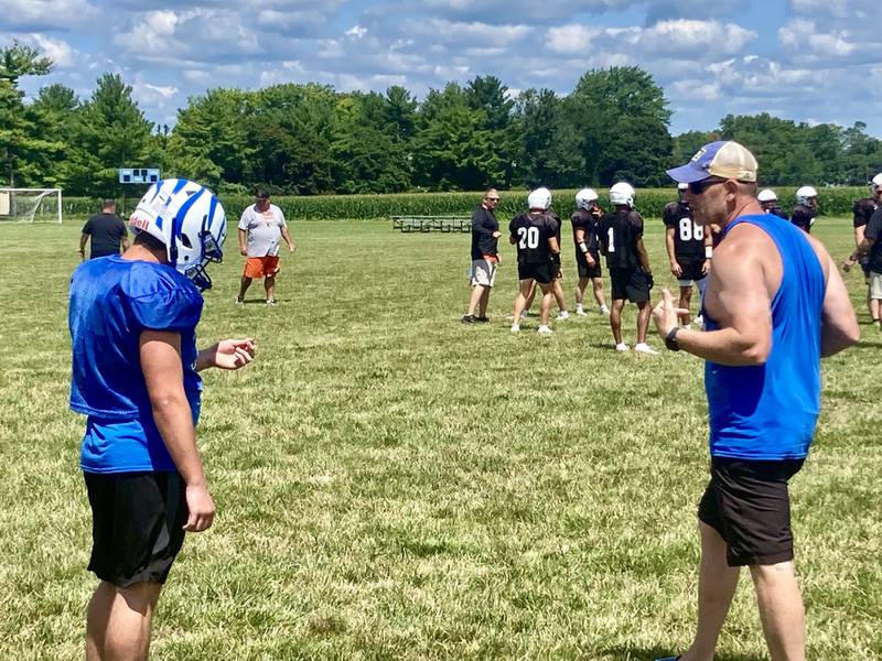 Princeton assistant coach R.K. Lunn instructs during the controlled practice/scrimmage at Little Siberia Field on Thursday, July 18.