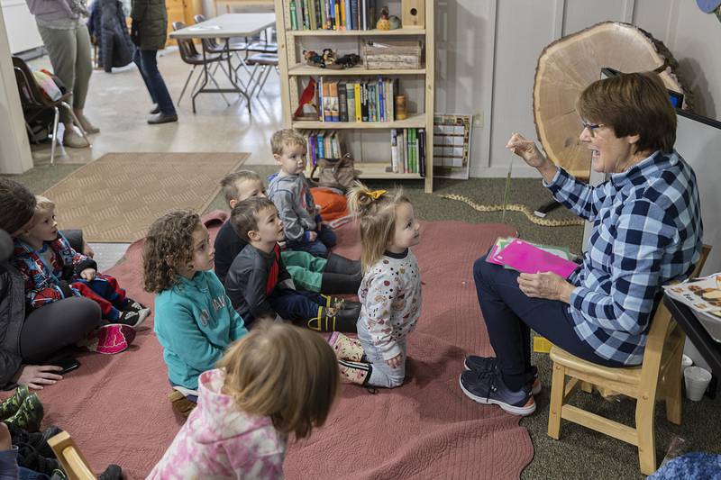 Wadsworth shows pictures of a fox to the kids in the nature class while teaching them the names of boy, girl and baby foxes. Next month’s forest animal will be all about the bear.