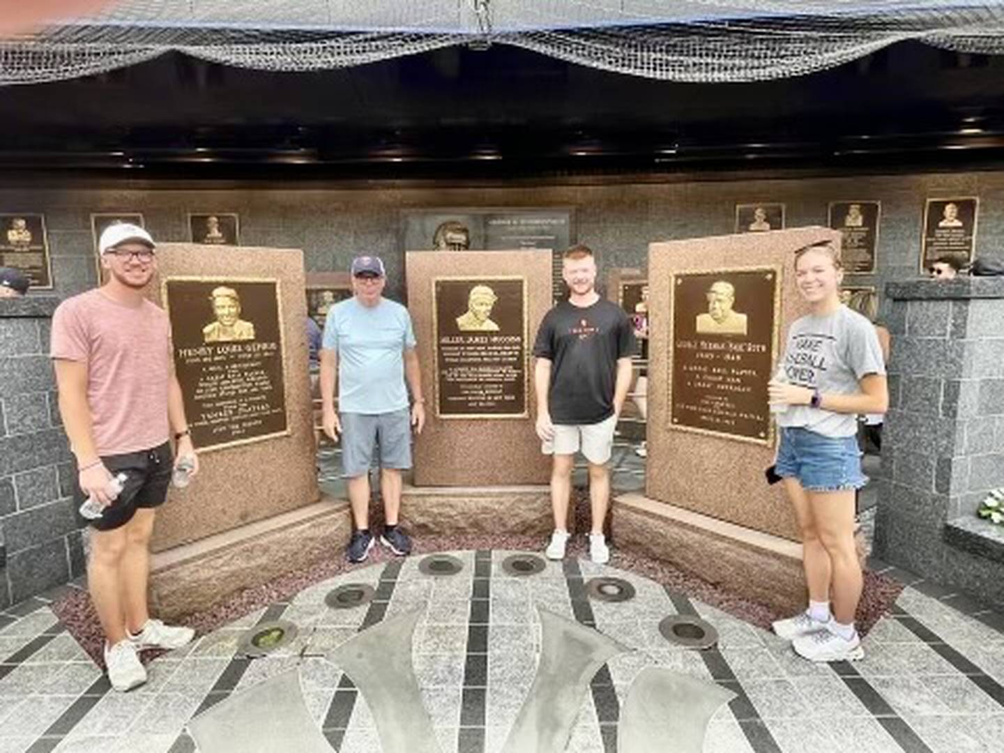 Adam (from left), Craig, Alex and Ellen Johnson visiting Monument Park on their recent trip to Yankee Stadium.