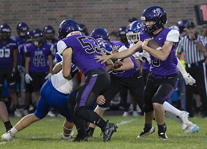 Dixon’s Tyler Shaner looks for running room Thursday, Sept. 14, 2023 against Genoa-Kingston in a game at Dixon High School.