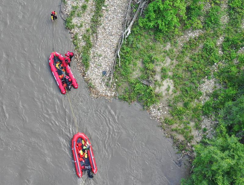 Oglesby, Utica and Tonica firefighters rescue a group of individuals who's raft overturned while on the Vermilion River on Wednesday, May 16, 2024 near Lowell. The group were stranded on a island about a half-mile west of the Illinois Route 178 bridge. The incident happened around 1p.m.