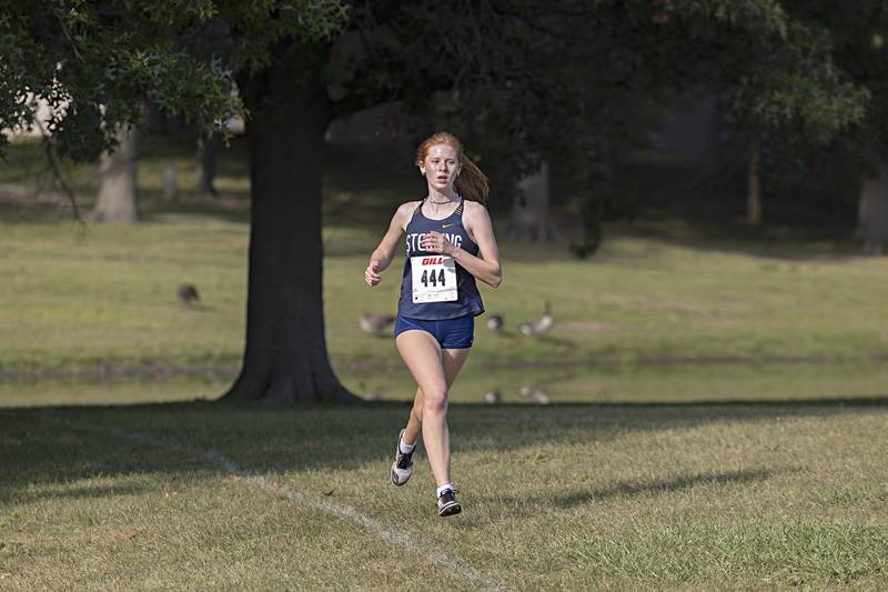 Sterling’s Delia Block heads for a fifth place finish Tuesday, Sept. 12, 2023 during the Twin Cities Cross Country Meet at Centennial Park in Rock Falls.