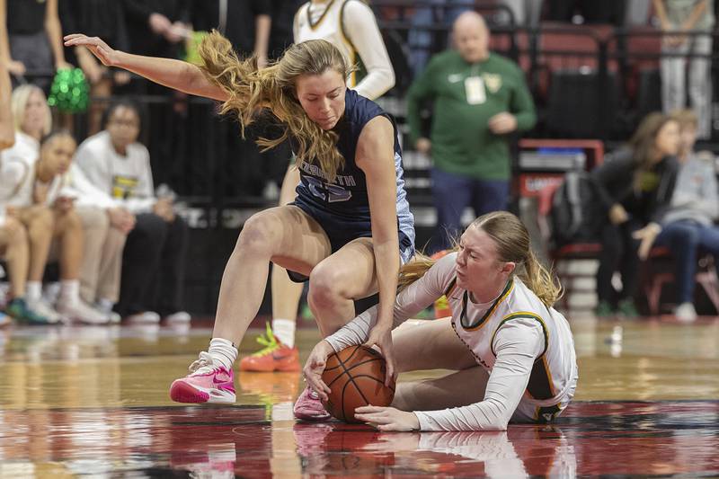 Nazareth Academy’s Amalia Dray and Waubonsie Valley’s Hannah Laub chase after a loose ball Friday, March 1, 2024 in the girls basketball 4A state semifinal at CEFCU Arena in Normal.