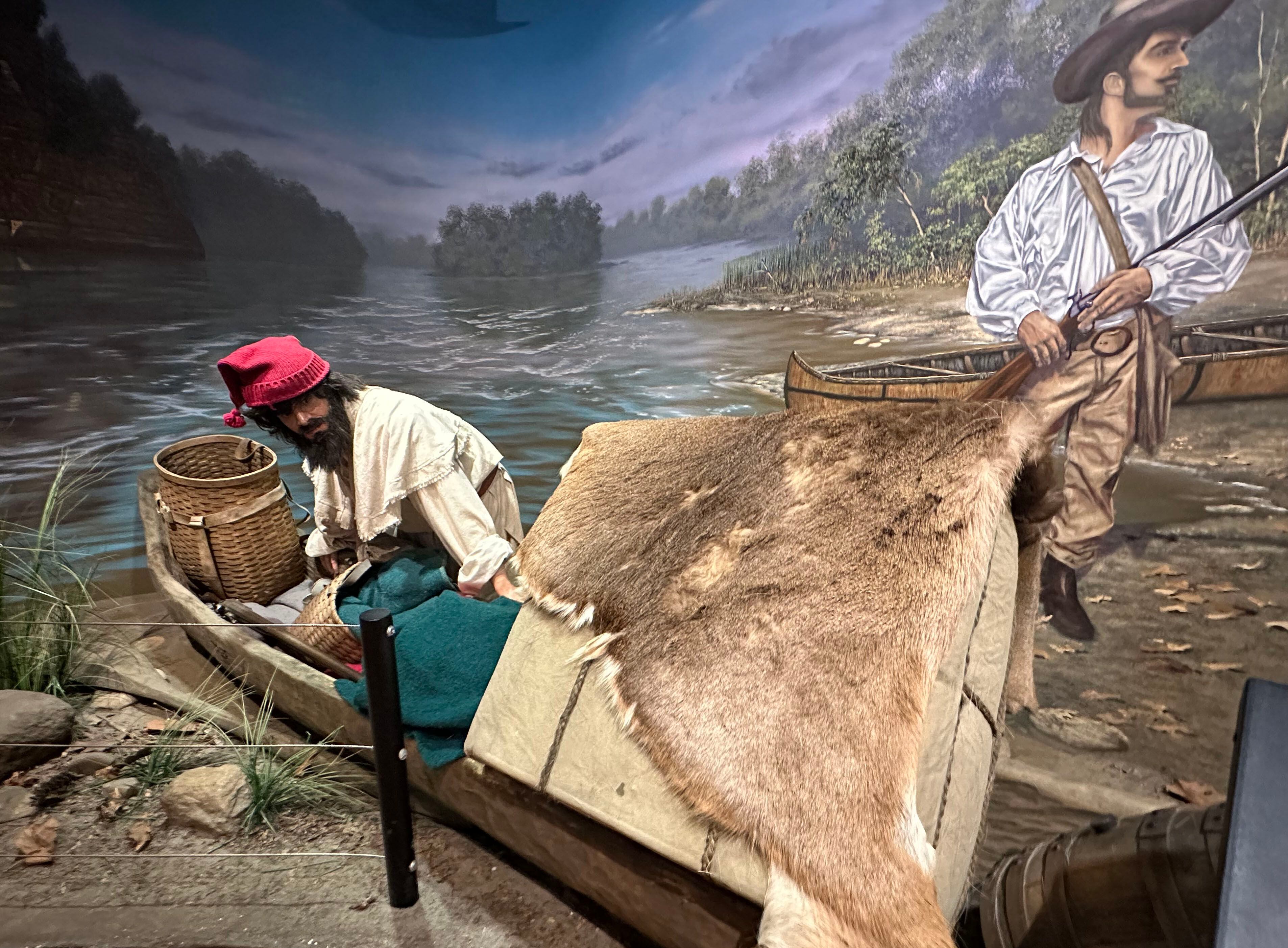 A life-size replica of how fur traders canoed when Father Jacques Marquette and Louis Jolliet set out on a four-month journey can be seen Tuesday, May 16, 2023, inside the visitors center at Starved Rock State Park. 