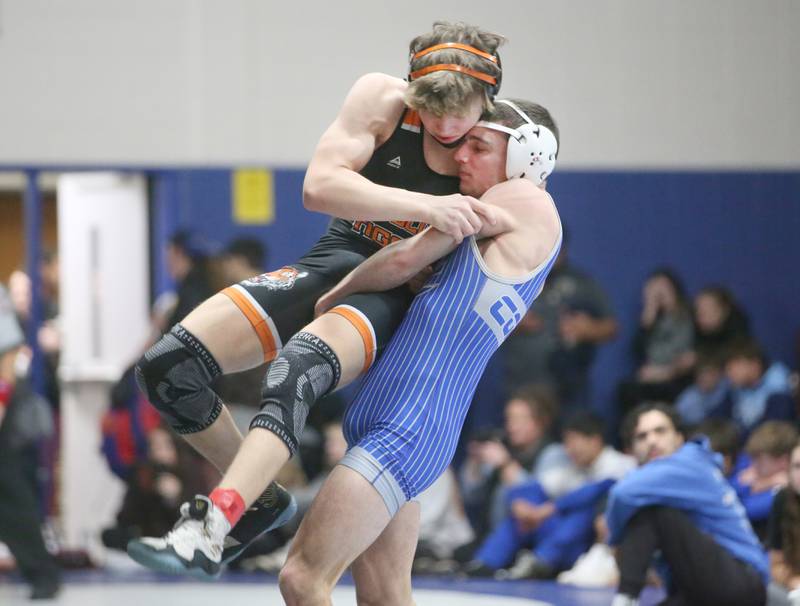 Newman's Carter Rude wrestles Jackson Carroll during the 60th annual Lyle King invitational wrestling tournament on Saturday, Jan. 6, 2023 in Princeton.