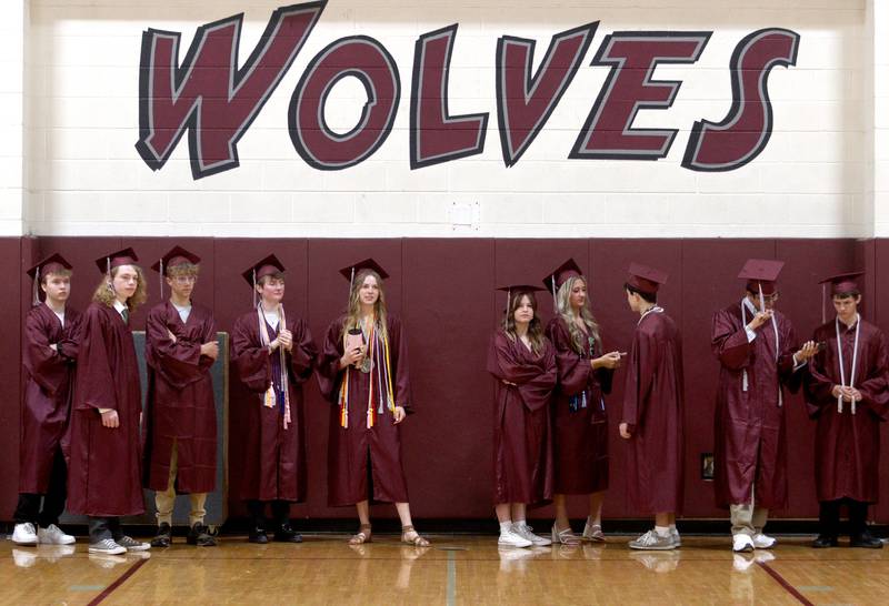 Members of the Prairie Ridge High School Class of 2024 line up before commencement at the school in Crystal Lake on Saturday.