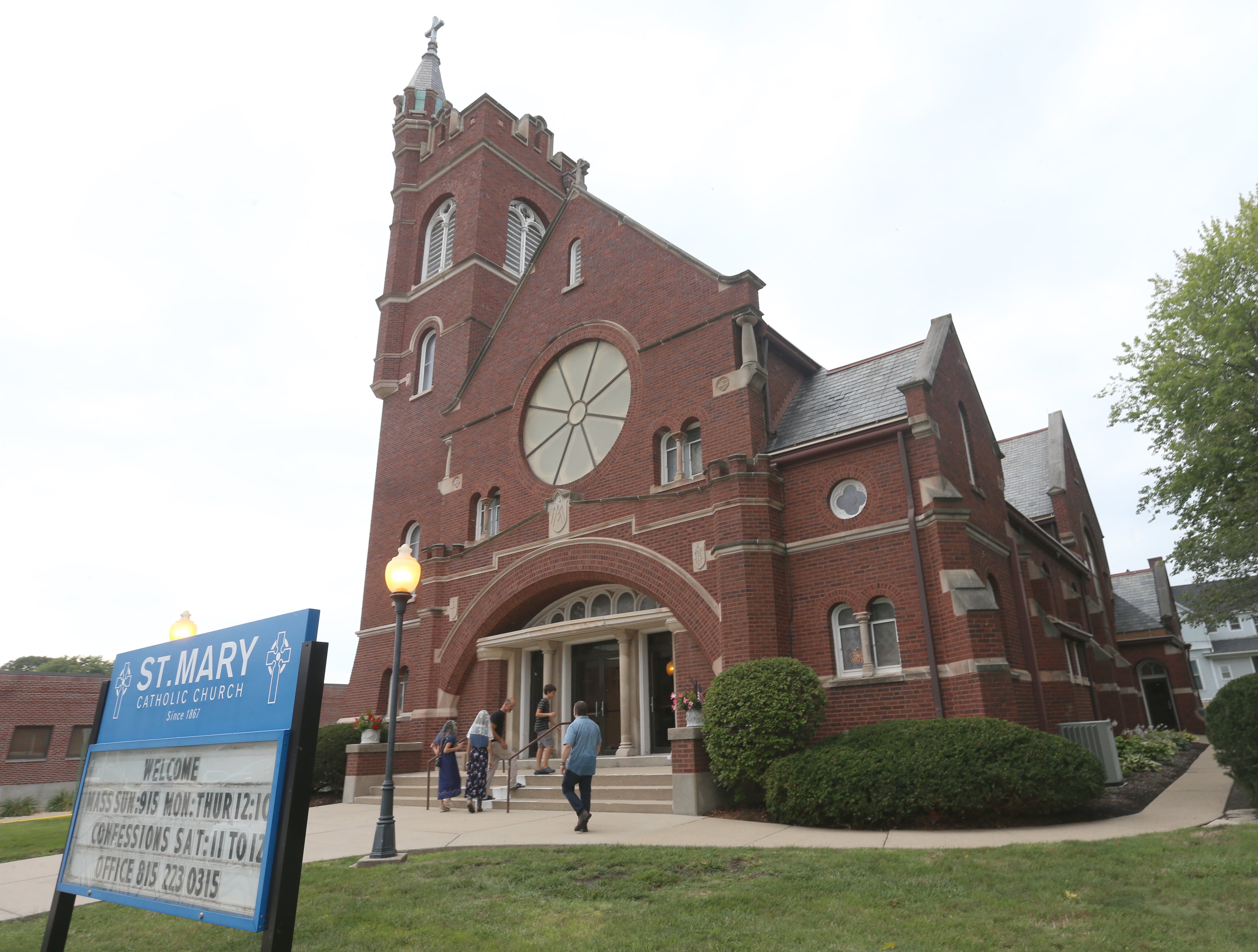 Parishioners enter St. Mary's Church during the final Mass on Thursday, Aug. 15, 2024 in Peru. The church was founded in 1867.