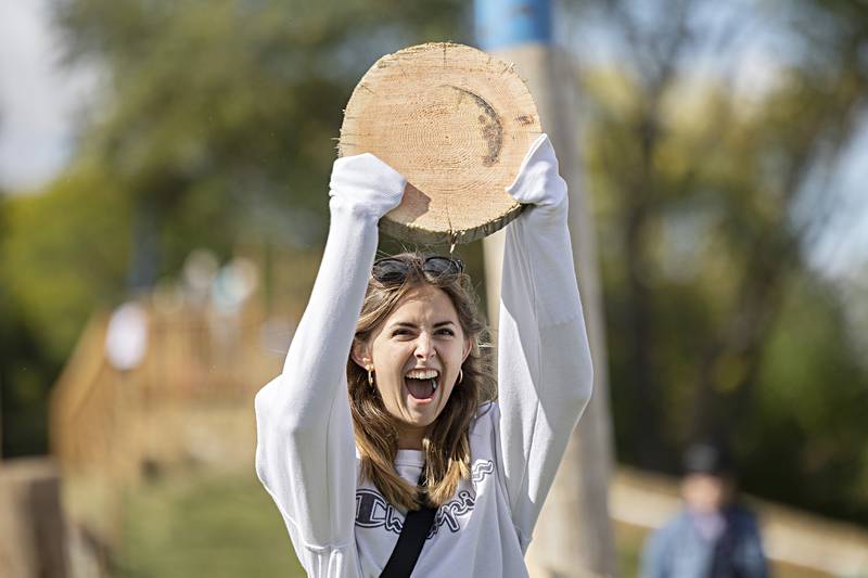 Tori Davis, shows off her consolation prize Saturday, Oct. 7, 2023 at the Rock Falls Tourism Lumberjack show.