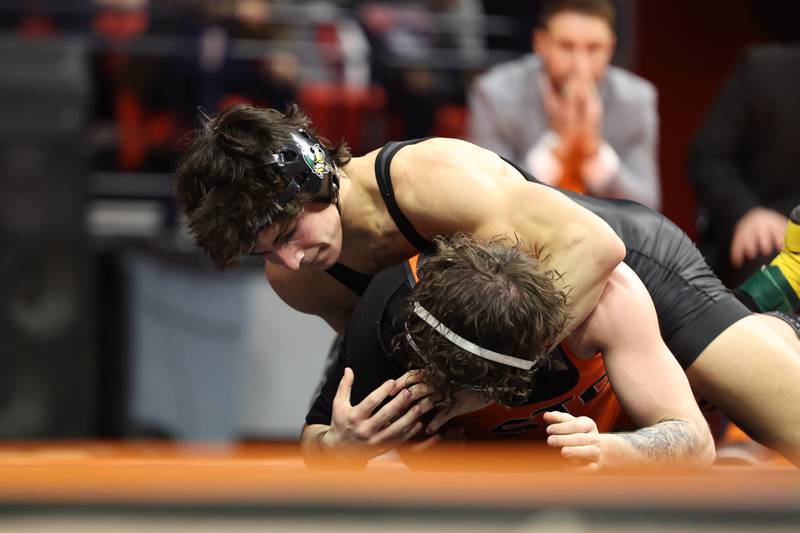 Fremd’s Evan Gosz St. Charles East’s Jayden Colon in the 144-pound Class 3A state championship match on Saturday, Feb. 17th, 2024 in Champaign.