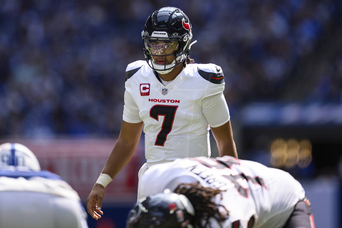 Houston Texans quarterback C.J. Stroud (7) looks over the defense during an NFL football game against the Indianapolis Colts, Sunday, Sept. 8, 2024, in Indianapolis. The Texans defeated the Colts 29-27. (AP Photo/Zach Bolinger)