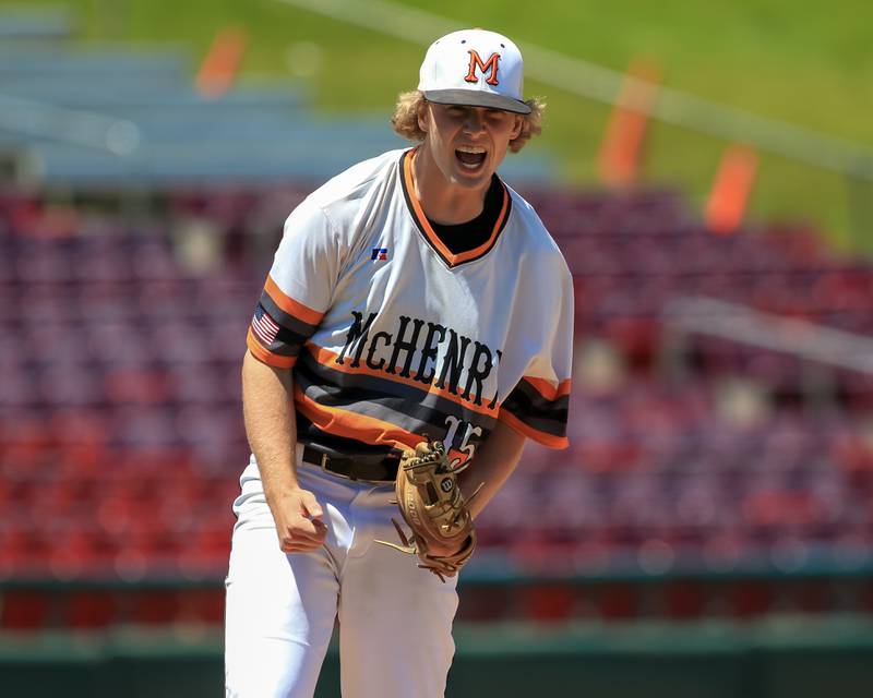 McHenry's Gavin Micklinghoff (15) celebrates a big out during the 2022 Class 4A Supersectional game between York and McHenry.