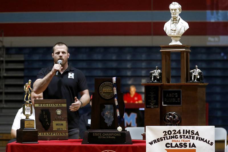 Marina Central Head Coach Jordan Blanton talks about the season as Marina Central honors their wrestlers that brought home the IHSA Class 1A Dual Team State Championship title on Friday, March 8, 2024, during a celebration at the high school in Woodstock.