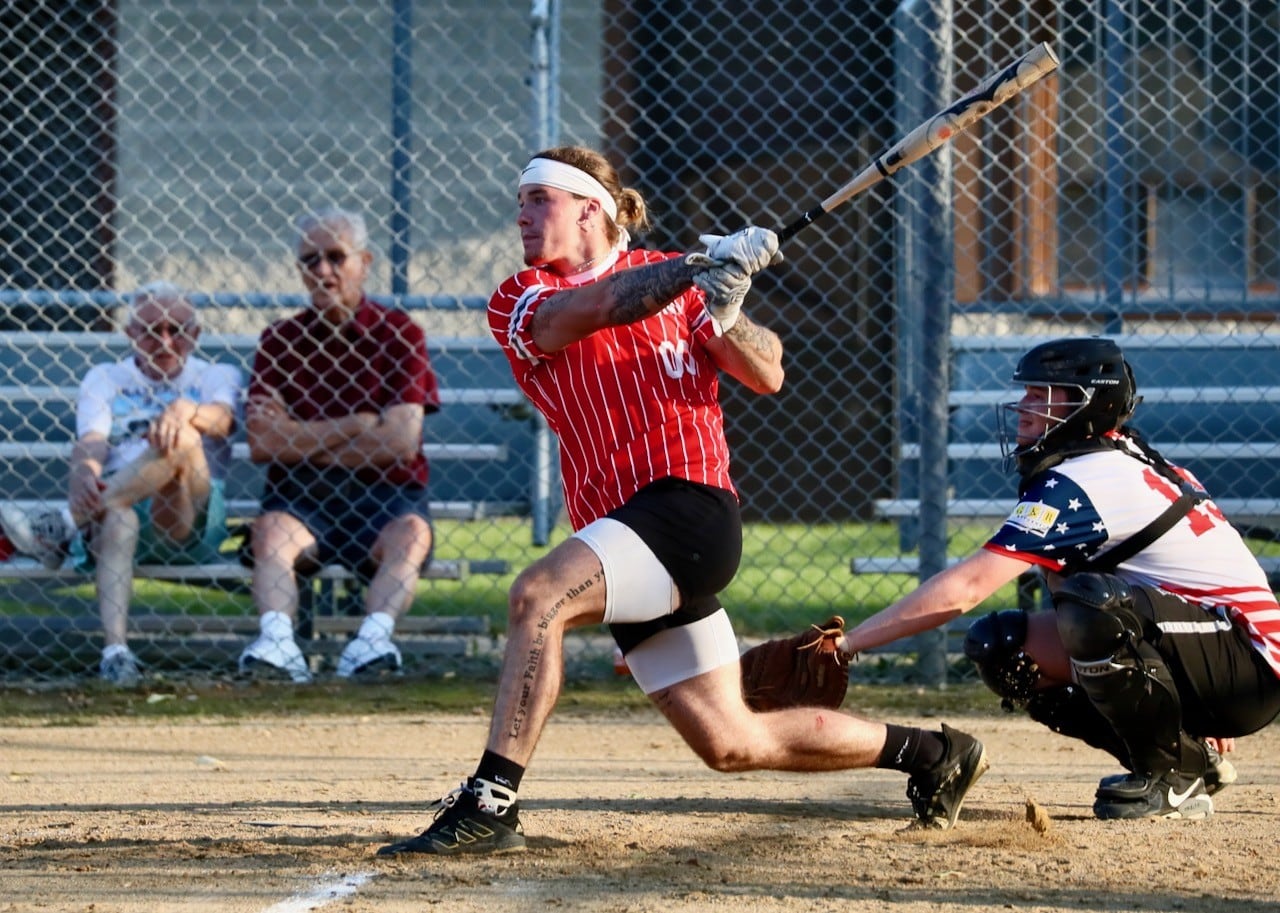 Noah Atkinson of Malden Methodist takes his cuts in Friday's Princeton Park District Fastpich League tournament play at Westside Park.