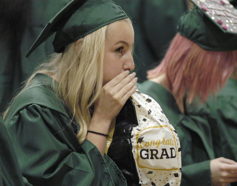 Savannah Buford blows up a balloon during graduation ceremonies. Rock Falls High School held the Class of 2024 commencement at Tabor Gym at Rock Falls High School on Sunday, May 26, 2024.
