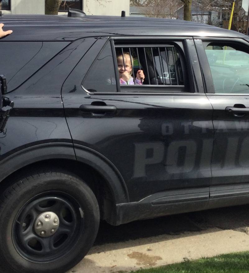 Children got an opportunity to visit with Ottawa police and tour police cars Wednesday, April 10, 2024, during Shake, Rattle, Read! at Reddick Library in Ottawa in celebration of National Library Week.