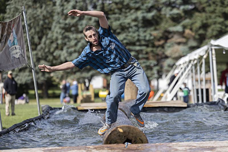 Tyler Berard loses his balance during the boom run at the Lumberjack show Saturday, Oct. 7, 2023.