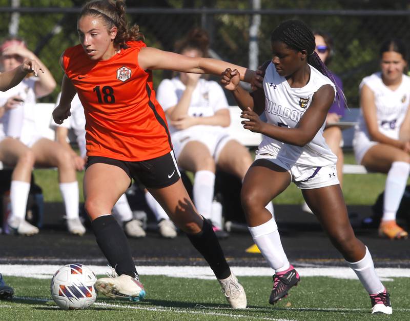 Crystal Lake Central's Sadie Quinn controls  the ball in front of Wauconda's Nariah Zastrow during the IHSA Class 2A Grayslake North Regional championship soccer match on Friday, May 17, 2024, at Grayslake North High School.