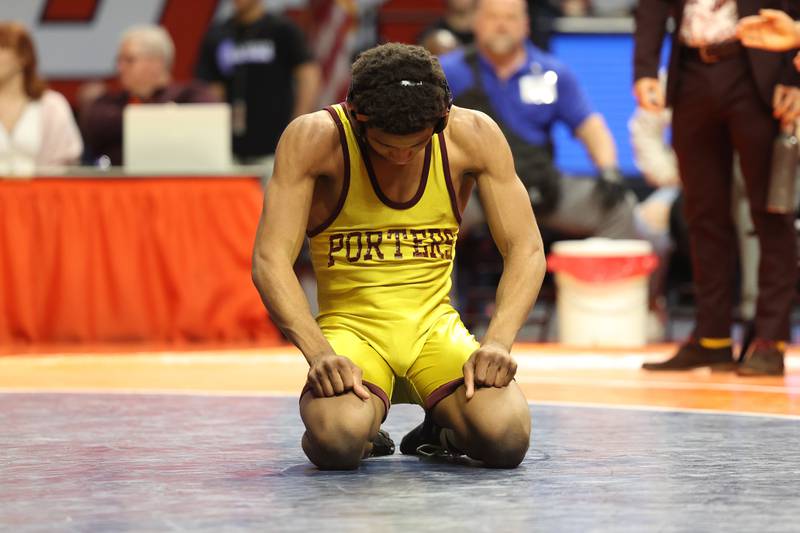 Lockport’s Justin Wardlow sit on the mat after his loss to Marmion’s Zach Stewart in the 138-pound Class 3A state championship match on Saturday, Feb. 17th, 2024 in Champaign.