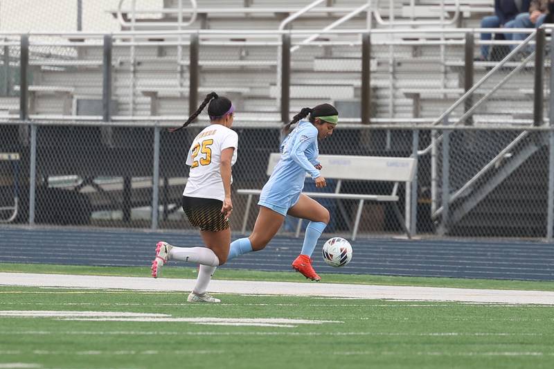 Plainfield South’s Jasmine Acosta works the ball along the sidelines against Joliet West on Thursday, April 18, 2024.