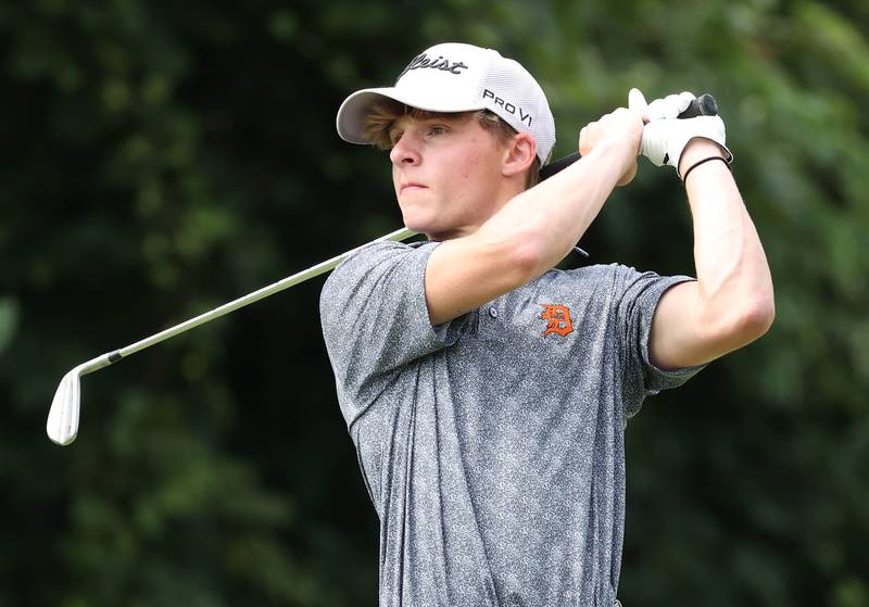 DeKalb’s Tyler Brackemyer hits his tee shot on the par three fourth hole Monday, Sept. 16, 2024, during the Mark Rolfing Cup at the Kishwaukee Country Club in DeKalb.