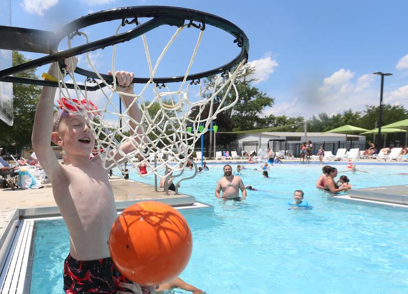 Heath Richards dunks a basketball at Riordan Swimming Pool on Monday, June 17, 2024 in Ottawa.