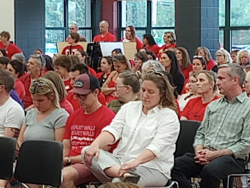 About 200 people attended the Batavia District 101 meeting on Tuesday, most of them members of the Batavia Education Association, wearing red shirts to show solidarity.