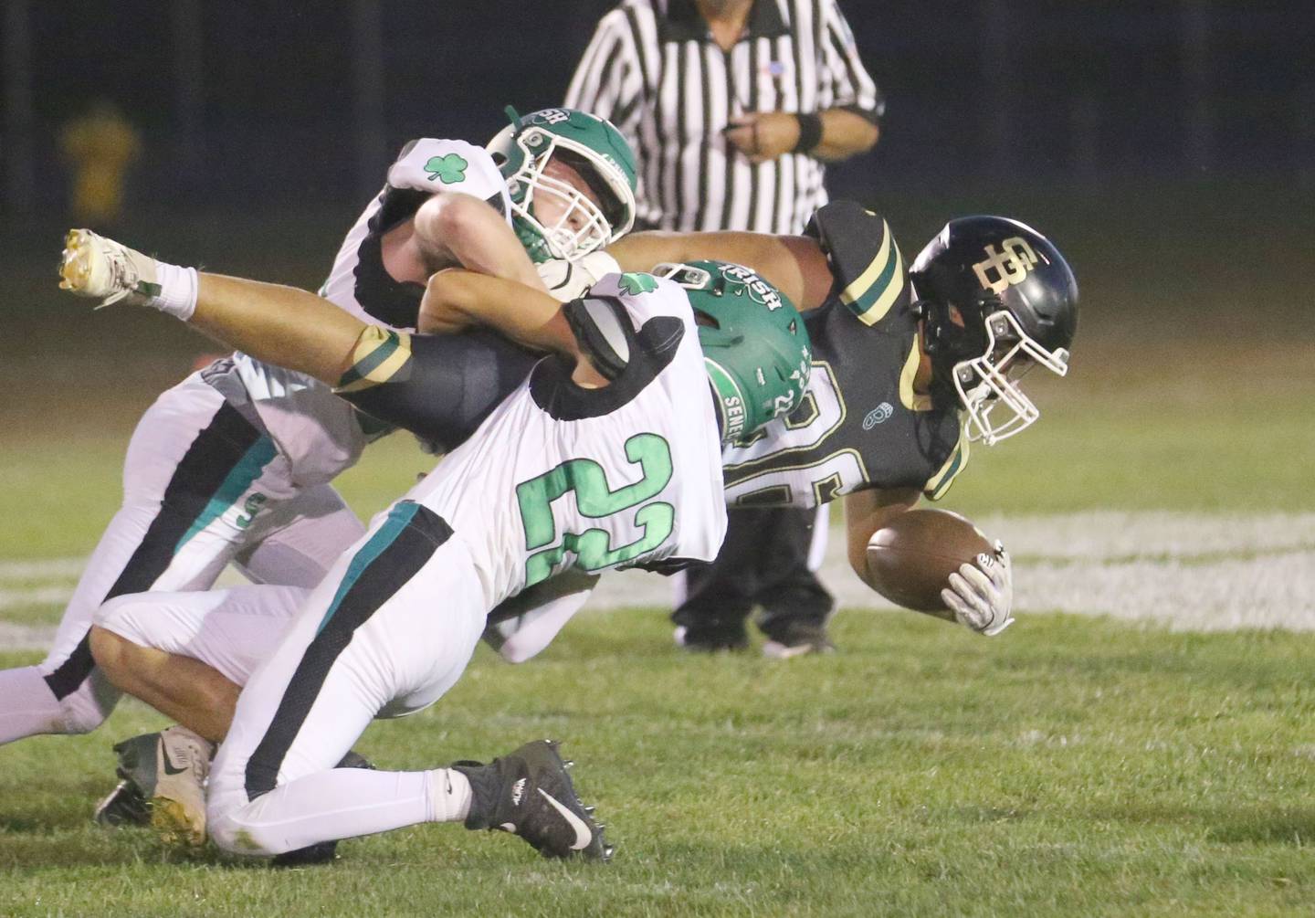 St. Bede's Landon Marquez is taken down by Seneca's Brady Sheedy and company on Friday, Sept. 20, 2024 at St. Bede Academy.