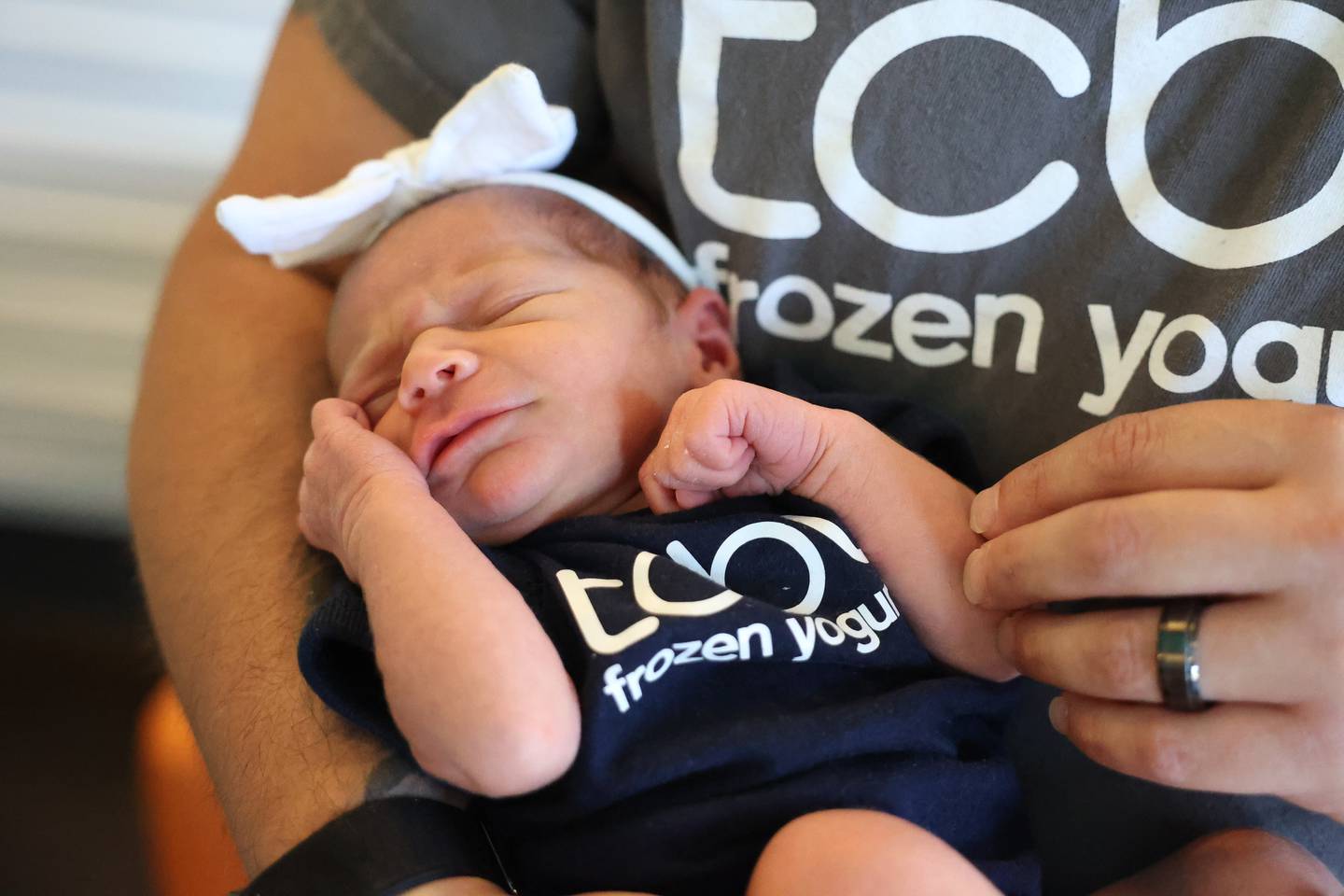 Newborn Avery Brodeur wears a TCBY frozen yogurt onesie on Thursday June 6, 2024 in Shorewood.