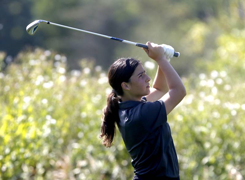 Woodstock’s Angela Pecoraro watches her fairway shot on the 7th hole of Valley course during the McHenry County Tournament on Thursday, Sept.12, 2024, at Boone Creek Golf Club in Bull Valley.