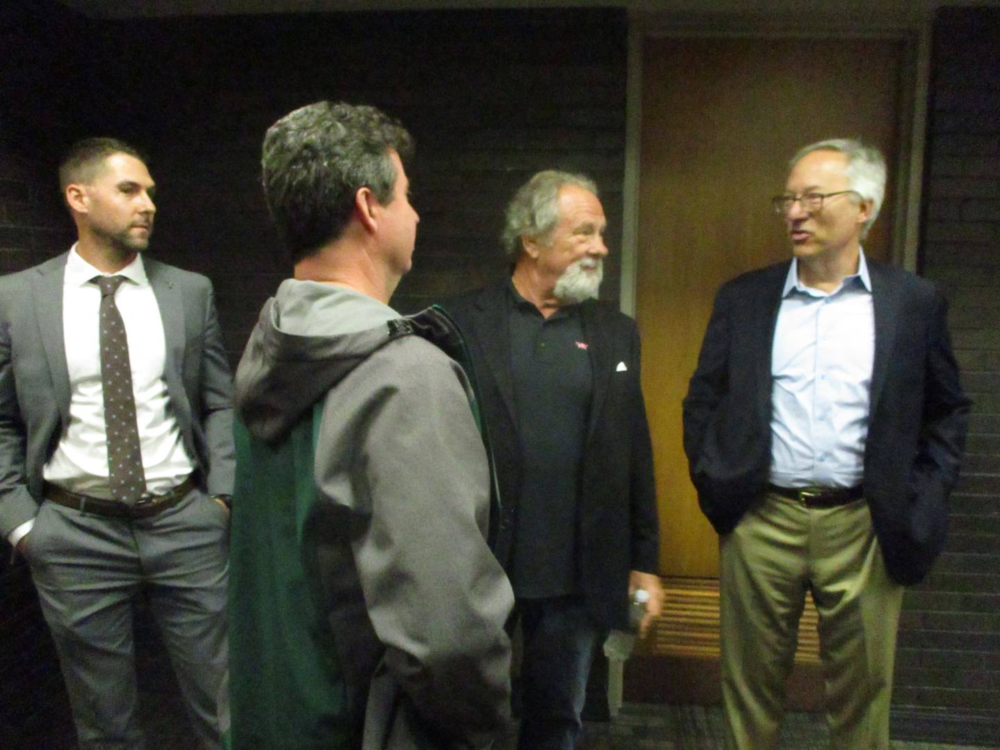 Mike Veeck (second from right) and Joliet Slammers owner Nick Semaca (right) spend some time at Joliet City Hall on Monday with former Slammers player Ryan Quigley (left), now director of institutional advancement at Joliet Catholic Academy and Slammers season ticket holder Craig Lichtenwalter. Nov. 6, 2023.