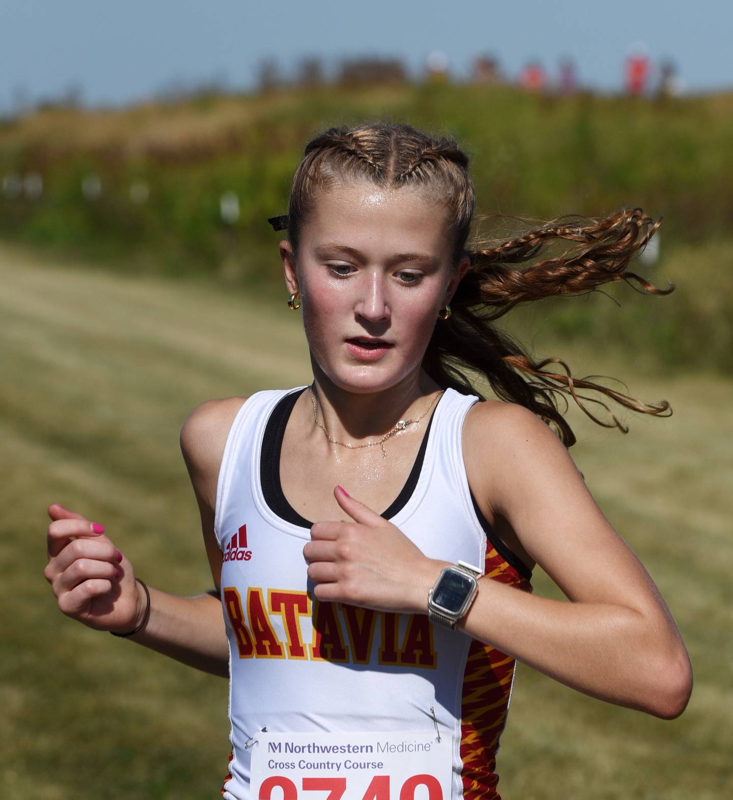 Batavia’s Avery Hacker wins the girls race during the Kane County cross country invite on Saturday, Aug. 31, 2024 in Geneva.