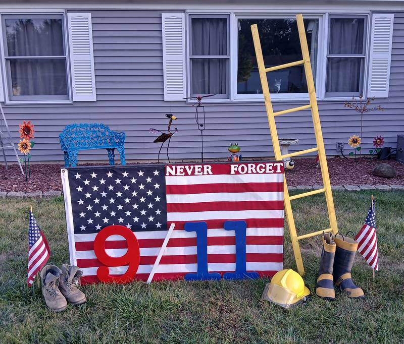 Derek Hardy of Marengo set up a 9/11 memorial outside his home, shown on Sept. 11, 2024.