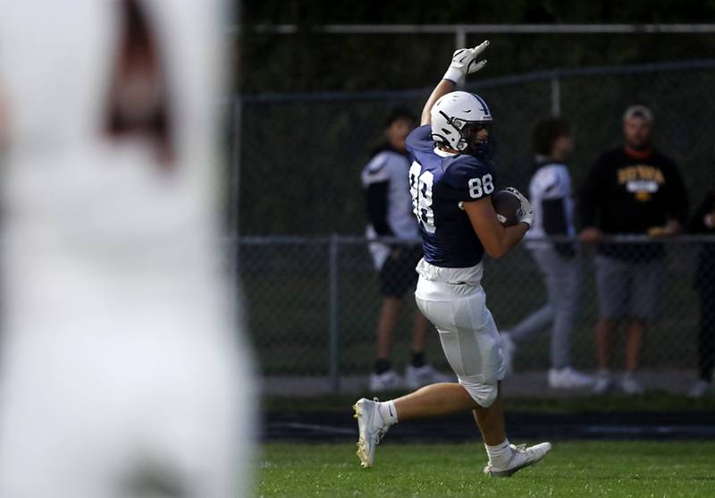 Cary-Grove's Quintin Witt scores a touchdown during a Fox Valley Conference football game against Crystal Lake Central  on Friday, Sept. 6, 2024, at Cary-Grove High School in Cary.