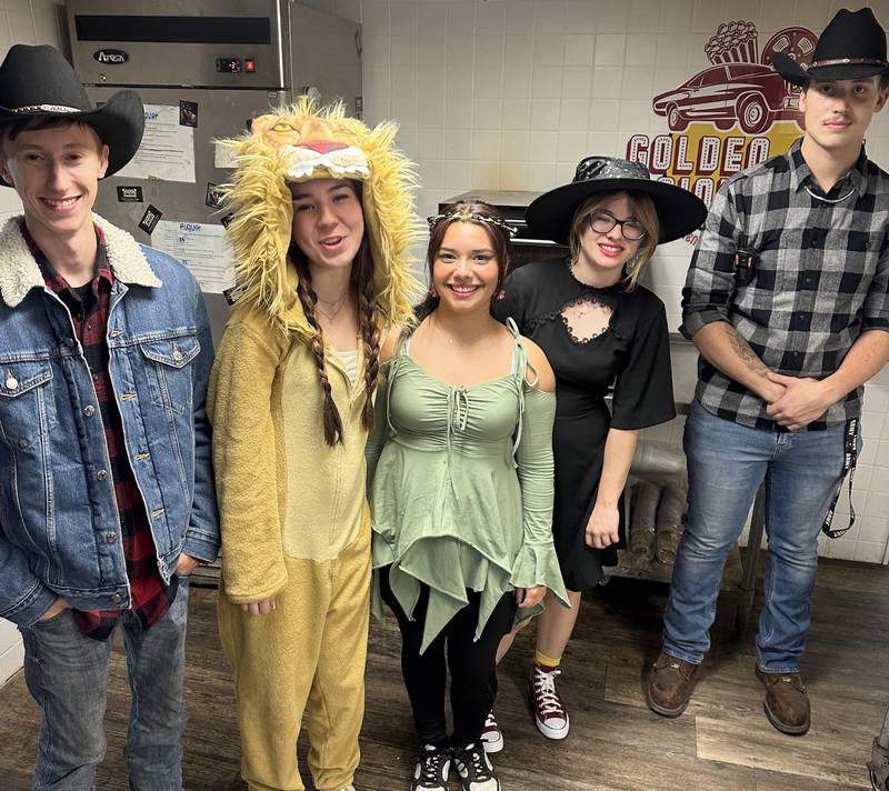 Staff members dress in costume at the McHenry Outdoor Theater. The theater will show grindhouse and horror films Oct. 31-Nov. 2. Visitors dressed in costume will have a shot at prizes, with $15-per-carload pricing in effect all three nights.