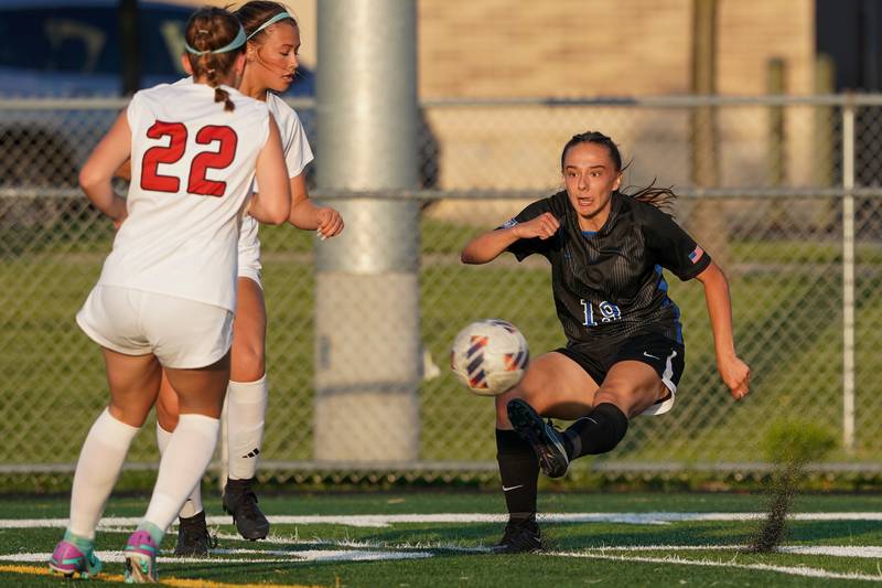 St. Charles North's Laney Stark (19) shoots the ball against Batavia during a Class 3A Batavia Regional final soccer match at Batavia High School in Batavia on Friday, May 17, 2024.