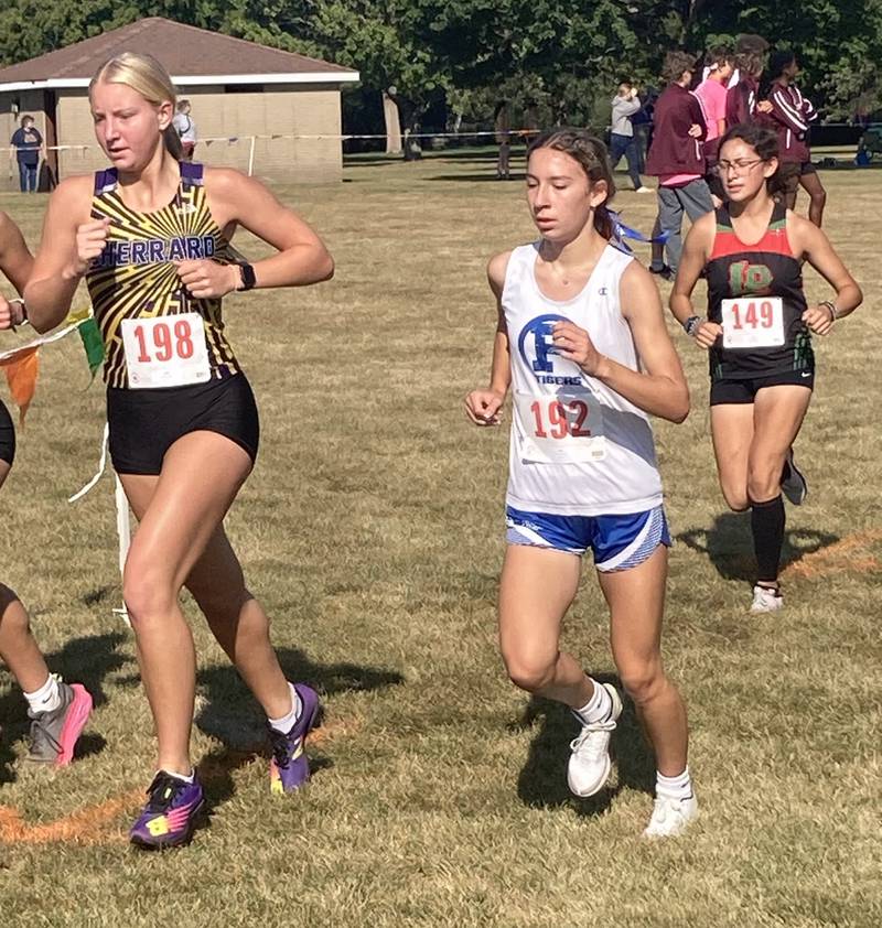 Princeton freshman Ruby Acker (192) runs in Saturday's Gary Coates Invitational at Zearing Park. She placed 12th.