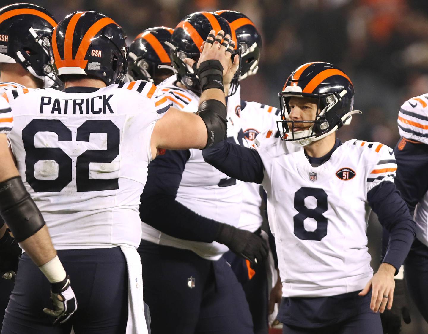 Chicago Bears place kicker Cairo Santos (right)  is congratulated after his field goal by guard Lucas Patrick late in the fourth quarter of their game against the Arizona Cardinals Sunday, Dec. 24, 2023, at Soldier Field in Chicago.