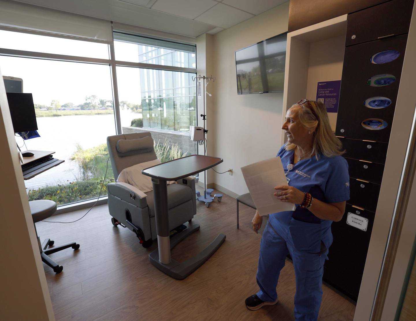 Ruth Marston RN talks about one of the new infusion rooms with a view at the newly remodeled and expanded Delnor Cancer Care Center, 304 S. Randall Road Thursday, Aug. 29, 2024 in Geneva. This expansion increased the center’s footprint by 15,500 square feet, expanding the total space to 56,988 square feet. An existing 17,000-square-foot space was updated with state-of-the-art equipment.