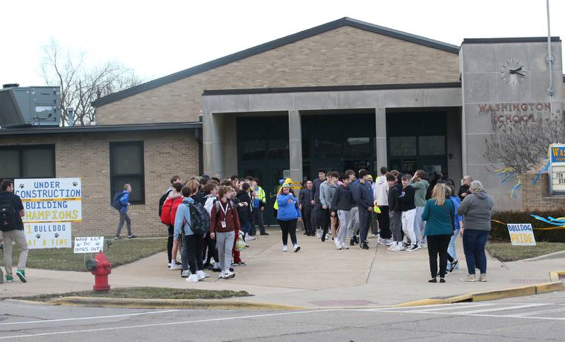 Supporters gather outside Oglesby Washington School to cheer on the 7th grade basketball team during a sendoff to the Illinois Elementary School Association Class 2A State championship on Thursday, Feb. 8, 2024 at Oglesby Washington School. Oglesby plays Effingham for the Class 2A State Title.